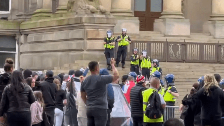 Demonstrators in Victoria square in Bolton