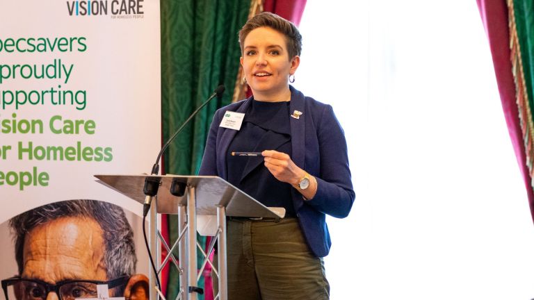 Green party co-leader Carla Denyer seen speaking at a Specsavers event calling for inclusive eye care for homeless people